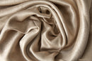 Logan - Textured Woven Blackout Eyelet Curtains in Taupe